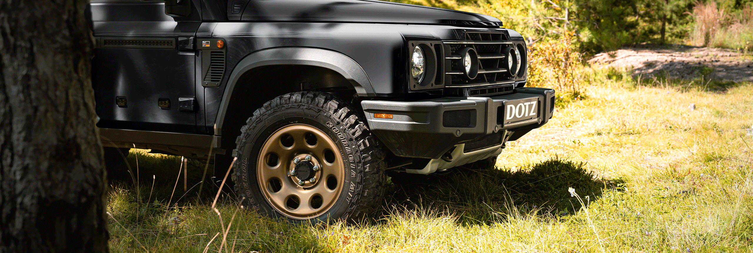 Cerchi in lega marca dotz 4x4 modello outland bronze su veicolo Ineos